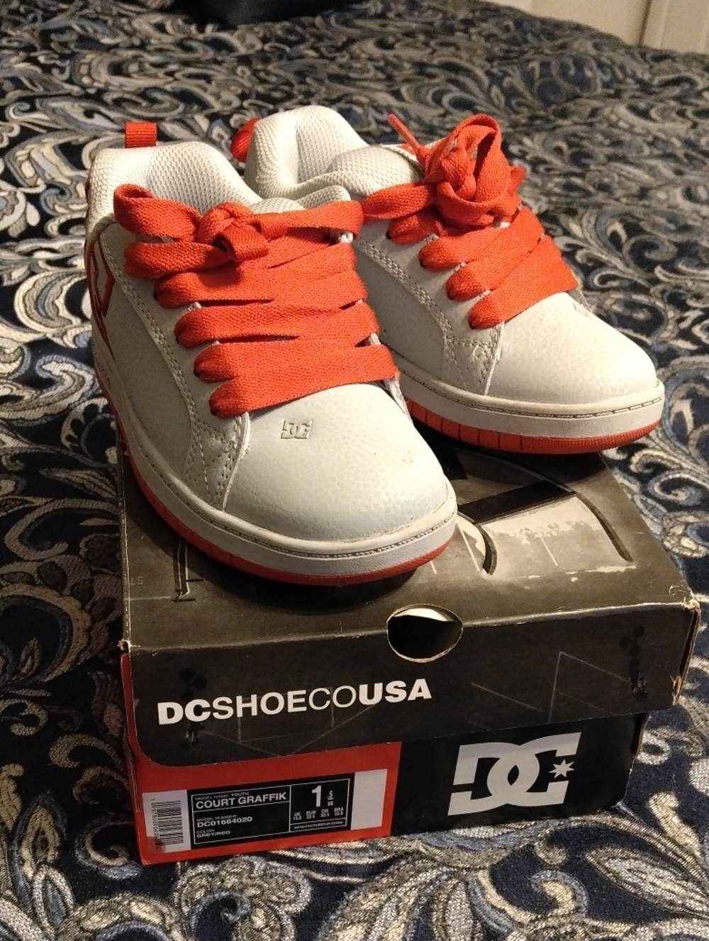 DC Kids' Court Graffik Sneakers in White and Orange
